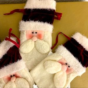4 adorable 3D plush Santa goodie bags